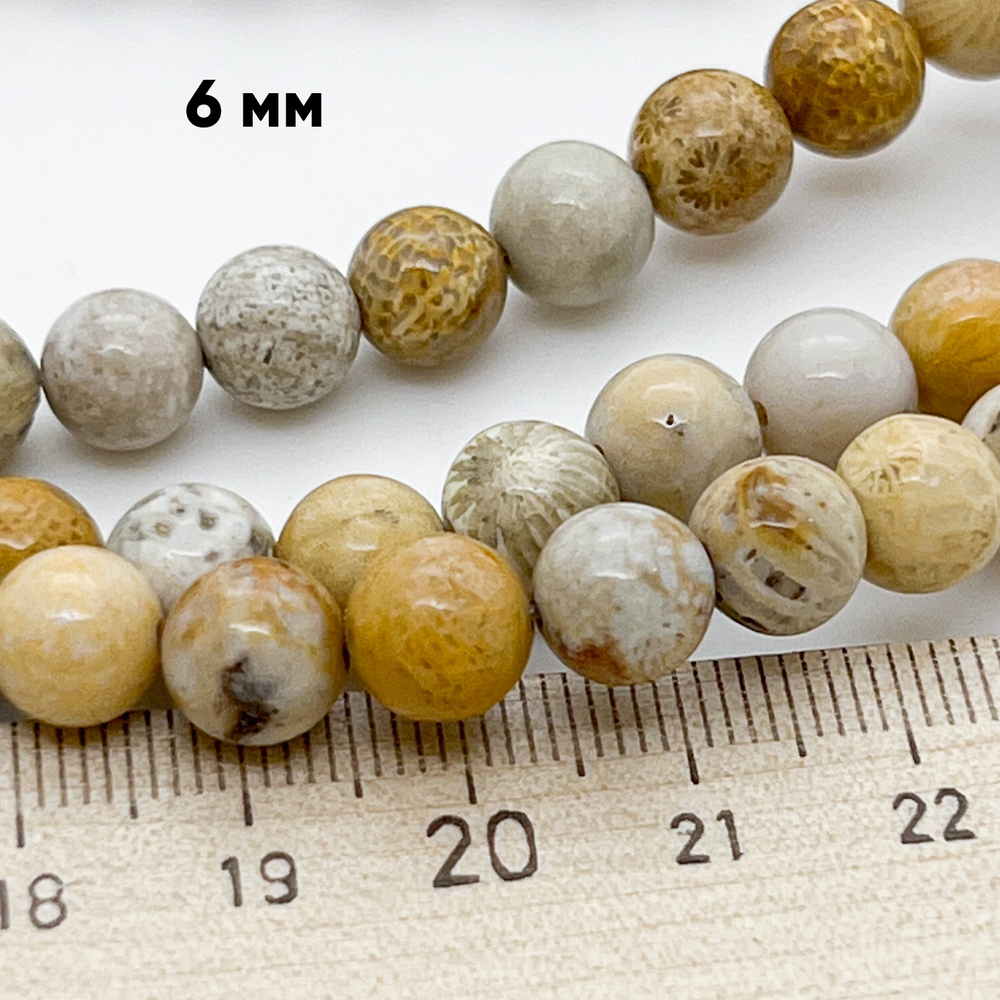 Коралл окаменелый, размер около 6,6-6,8 мм, цена за 28-29 шт (1/2 нити)