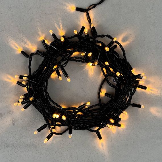 Светодиодная гирлянда с колпачком 100 экстра теплых белых LED ламп 10 м., 24В., черный провод ПВХ, IP65, LTC (PST100CAP-11-1EWW)