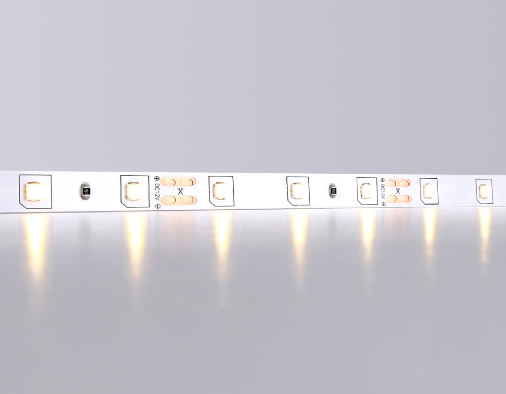 Светодиодная лента GS1001 2835 60Led/ 4.8W m/ 12V IP20 3000K/ 5000*8*1.2mm/ кратность резки 50mm (2 конт.)