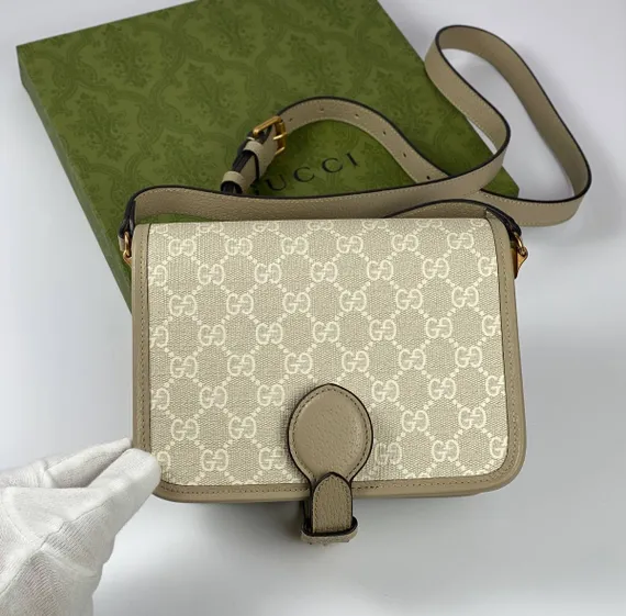 Миниатюрная сумка через плечо Gucci Interlocking G