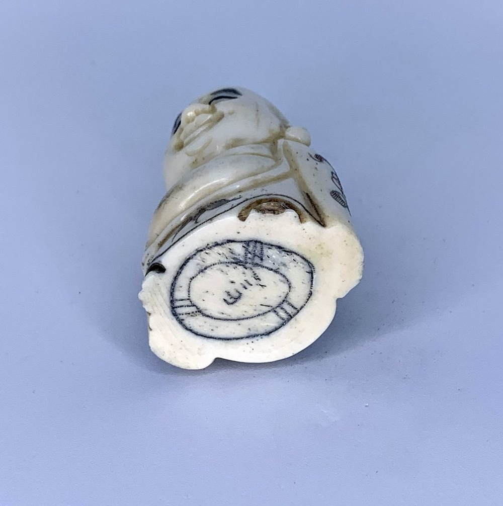 Нэцкэ Хотей