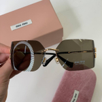 Солнцезащитные очки MIU MIU