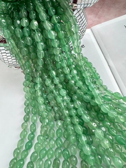 Нить бусин из тонированного кварца 8-9мм (галтовка)