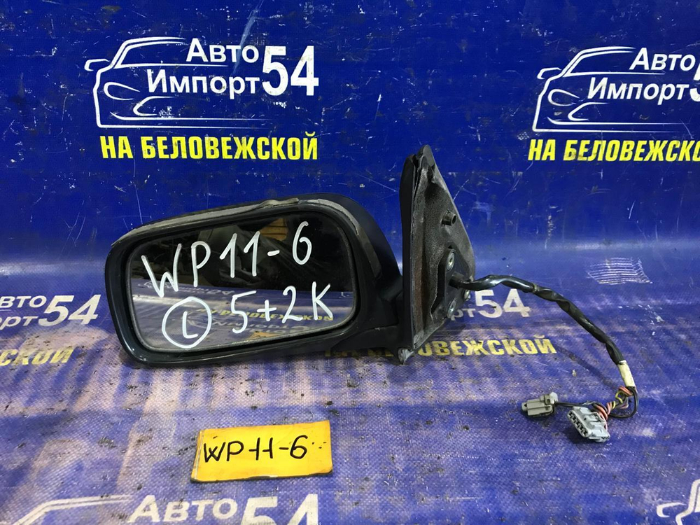 Зеркало левое NISSAN PRIMERA 1997