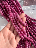 Нить бусин из тонированного кварца 8мм, гладкие