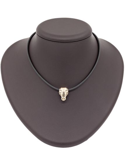 Фото бусины тигр из бронзы, вид на постаменте.