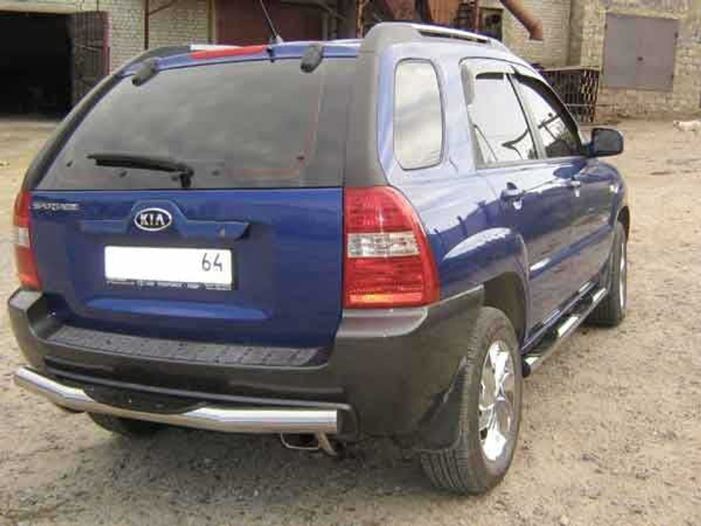 Защита заднего бампера (нержавейка) Kia Sportage New (2008-2010) d76 с проступями
