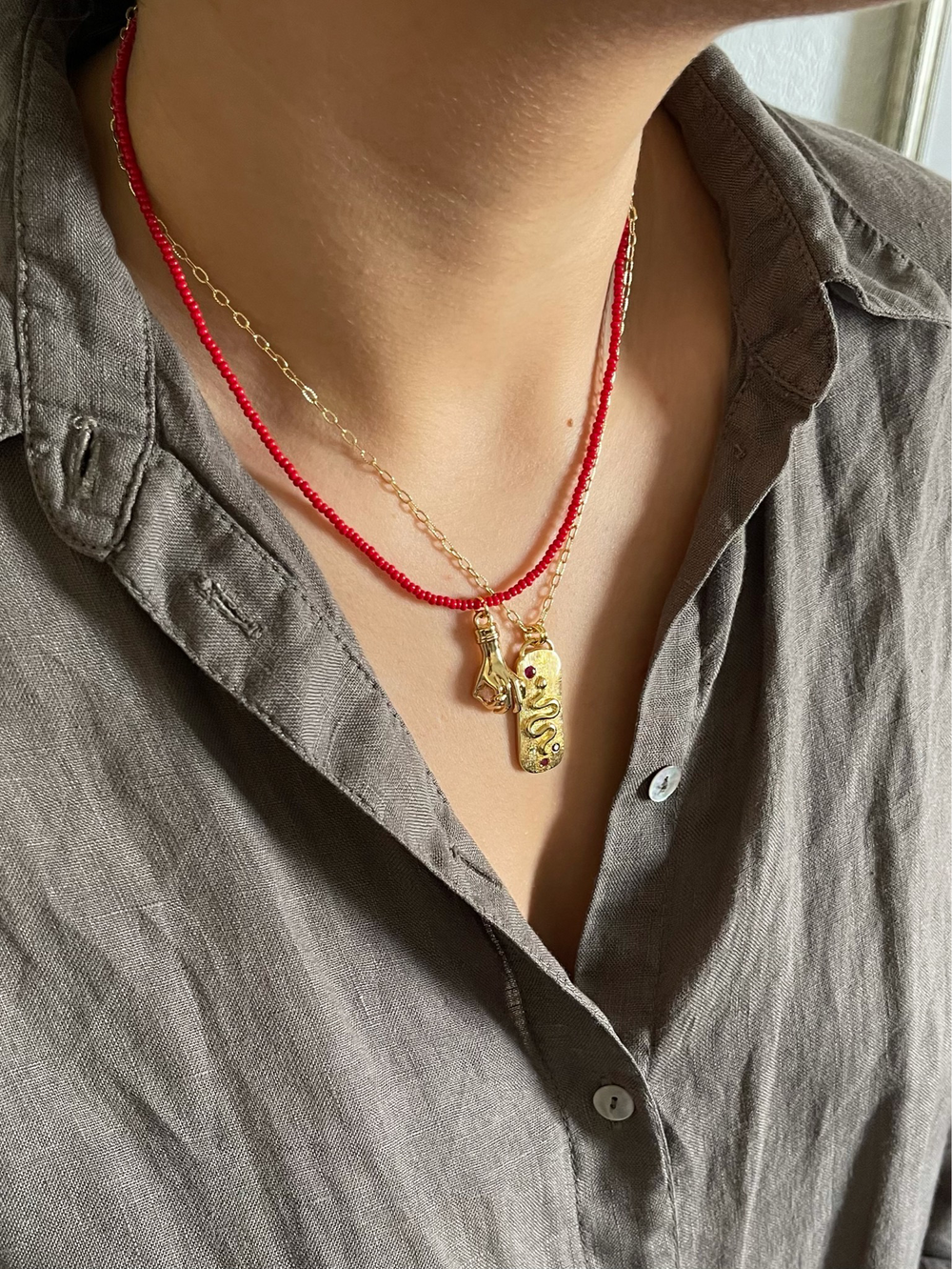 MANIOVICH Red Beads Necklace with Hand Pendant