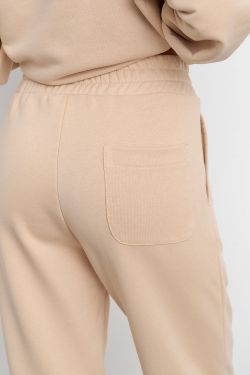 Свободные джоггеры без начеса из премиум футера ванильного цвета