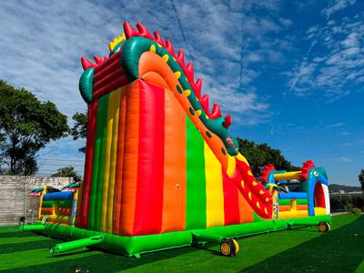 Коммерческий надувной батут «Змей Горыныч» с механизированной головой 14*8*7 м