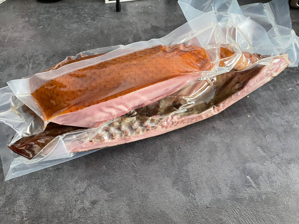 Утка горячего копченая половинка в упак.