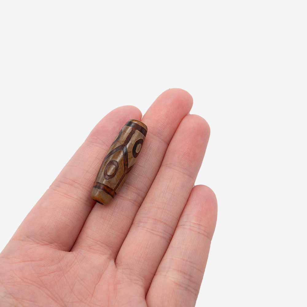 Бусина Дзи "Шесть глаз" из агата, 31*10мм, коричневый