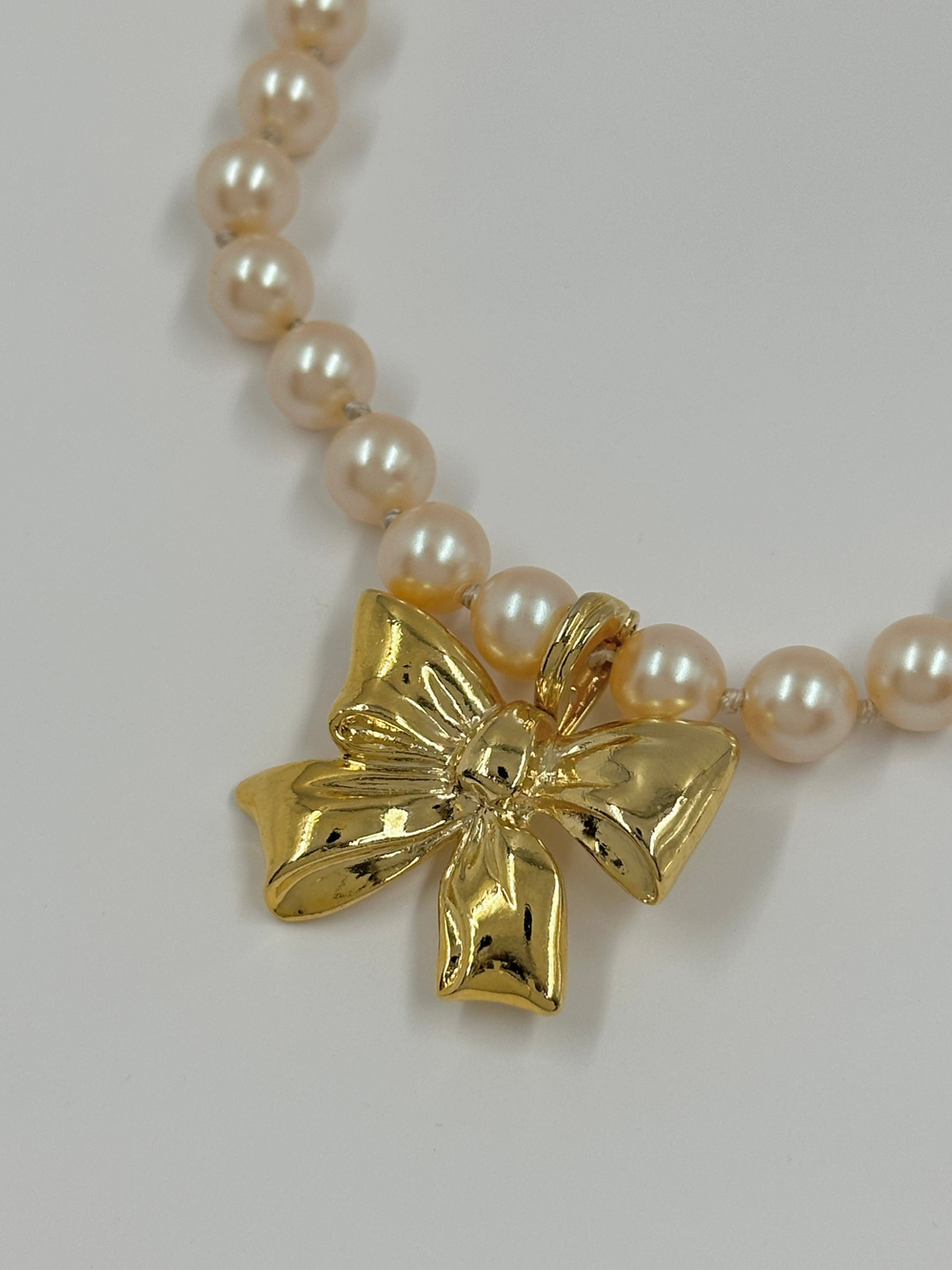 «Жемчужные» бусы со съёмной подвеской Бант