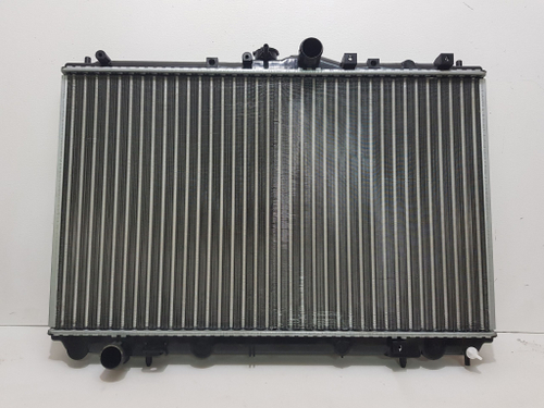 Радиатор охлаждения Mitsubishi Carisma