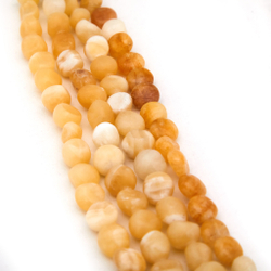 брелок на сумку из натуральных желтых камней