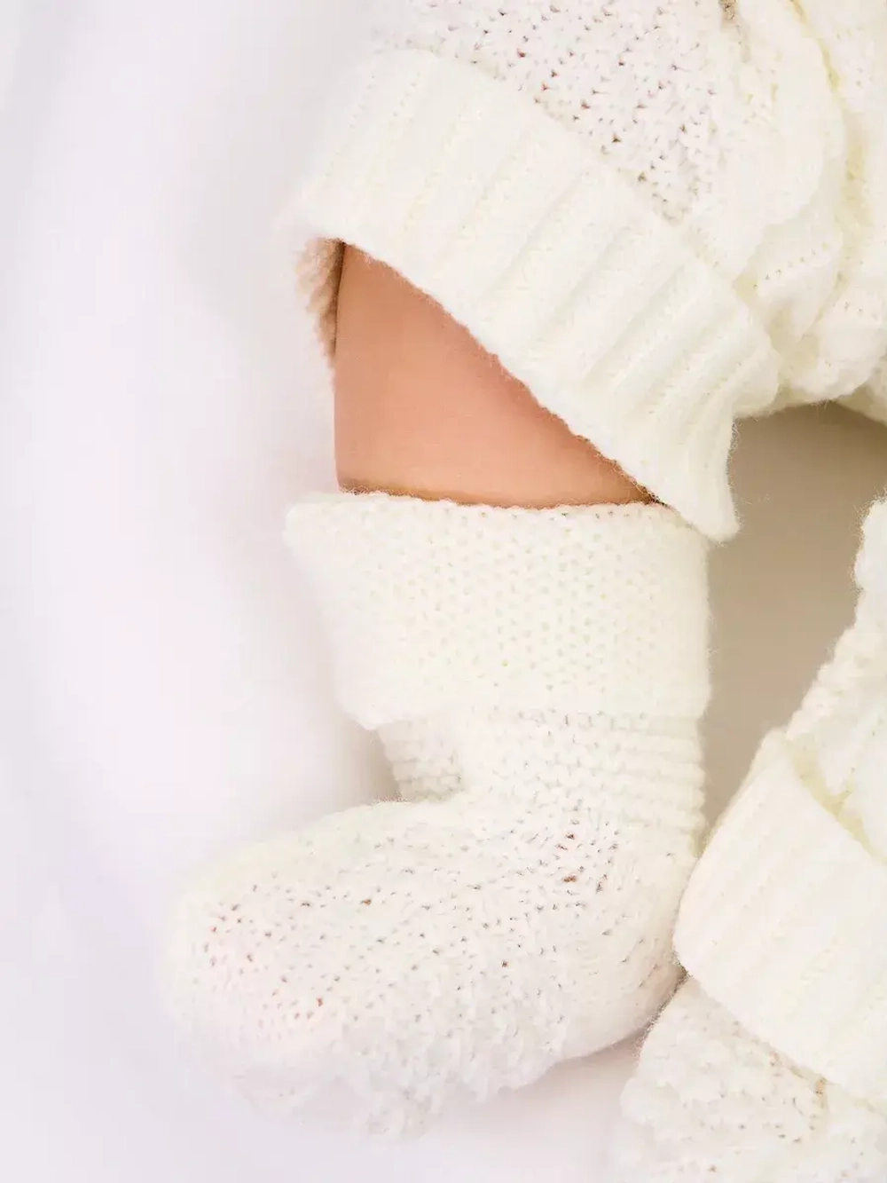 вязаный комбинезон для новорожденных