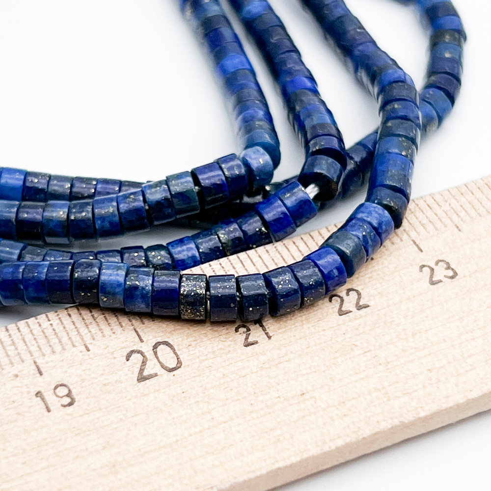 Лазурит бусины (тонирован), размер около 4*2 мм, цена за 37-38 шт (1/4 нити)