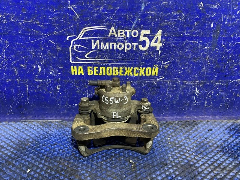 Суппорт тормозной передний левый MITSUBISHI LANCER CEDIA 2000