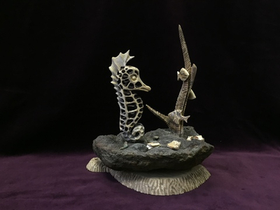 В глубине. Миниатюра из кости.