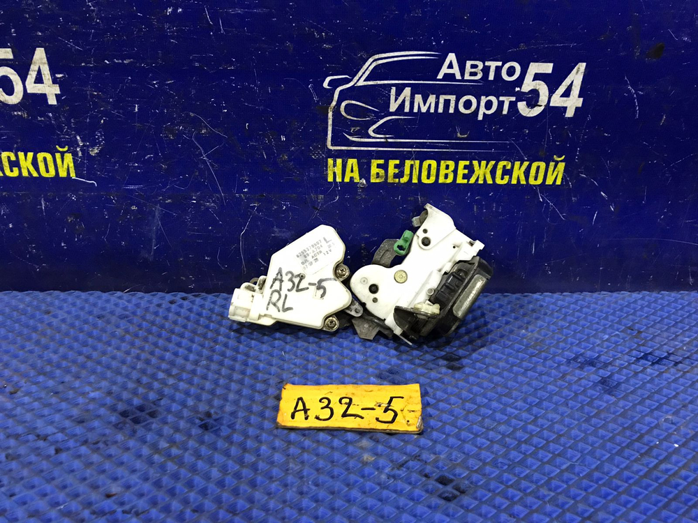 Замок двери задней левой NISSAN CEFIRO 1997