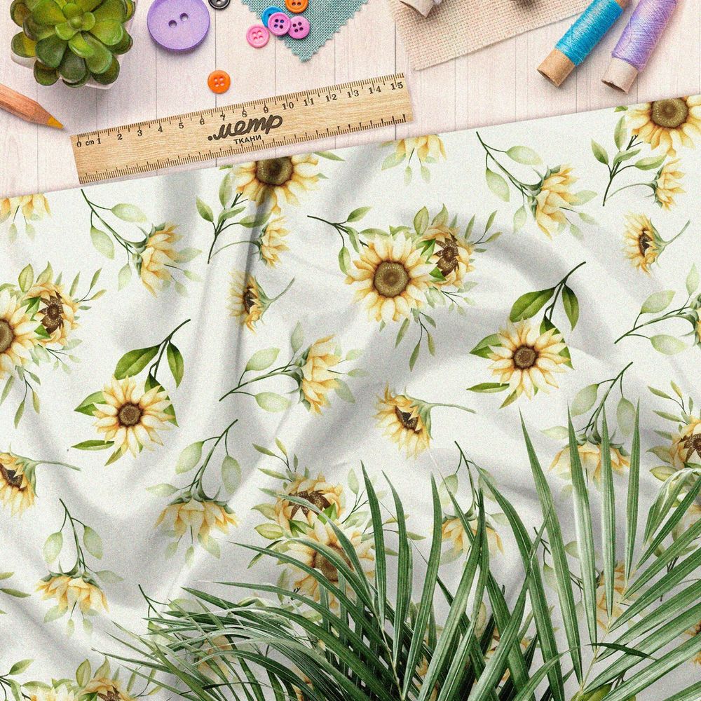 Ткань кулирная гладь подсолнухи на зеленом