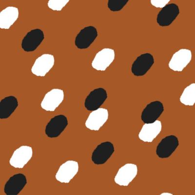 Разноцветные горошины на коричневом фоне