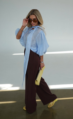 Брюки с защипами из струящейся ткани