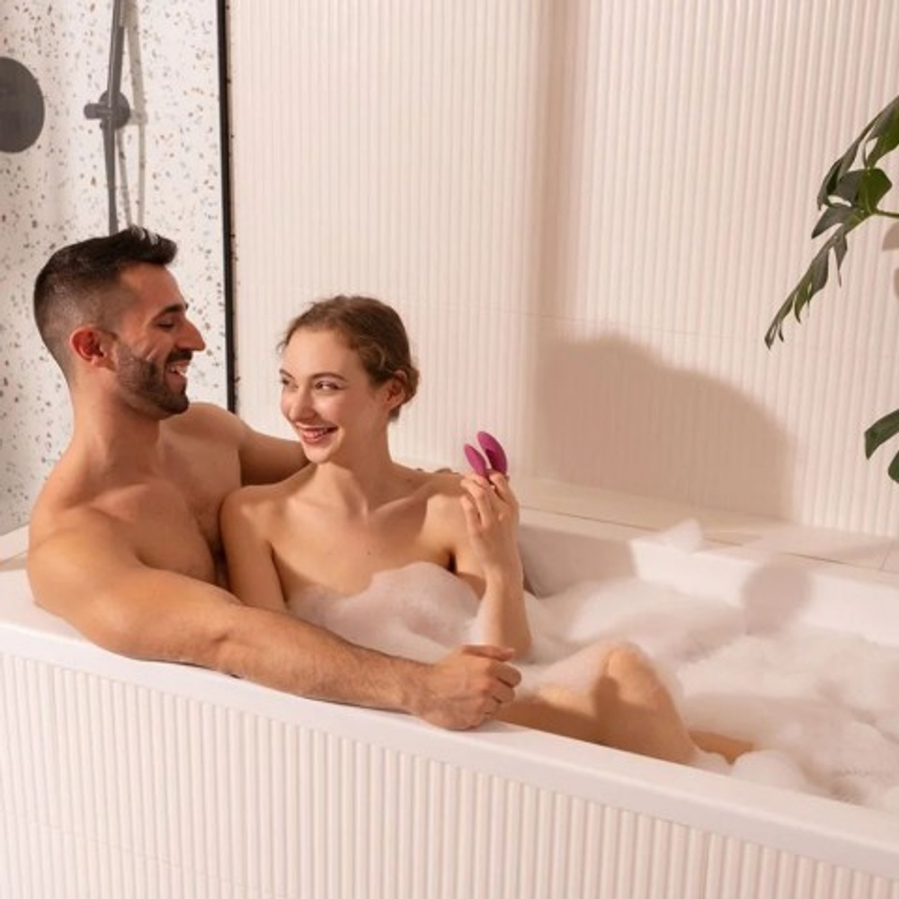 Вибратор для пар We-Vibe Sync 2 розовый (в комплекте батарейка для пульта)