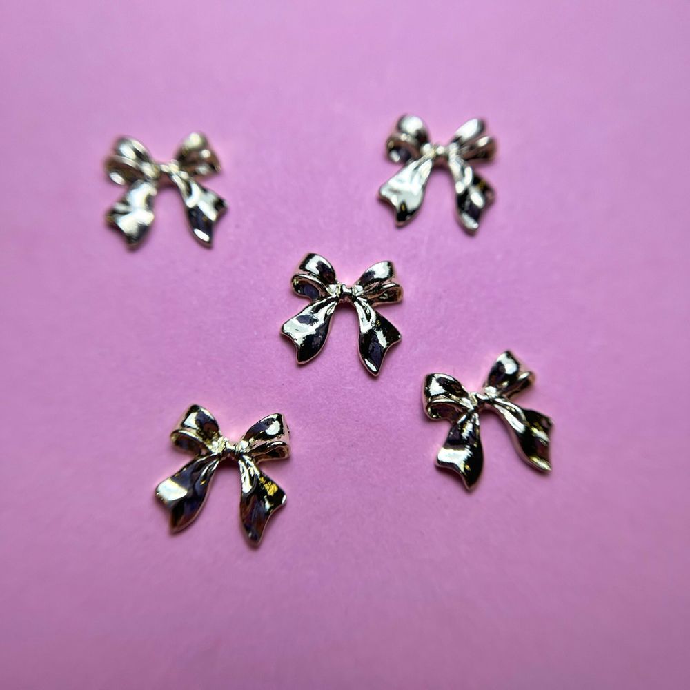 1854 Фигурки объёмные "Бантики" металл 5 шт