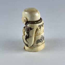 Статуэтка нэцкэ Мальчик Карако с карпом в руках