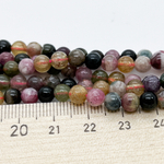 Бусины Турмалин, диаметр 5,3-5,4 мм, цена за 37-38 шт (1/2 нити)