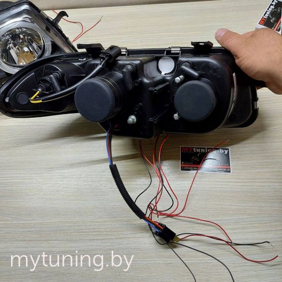 Передние фары Opel Astra F angel eyes black