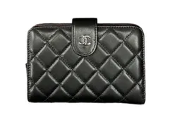Черный стеганый кожаный кошелек Chanel с L-молнией