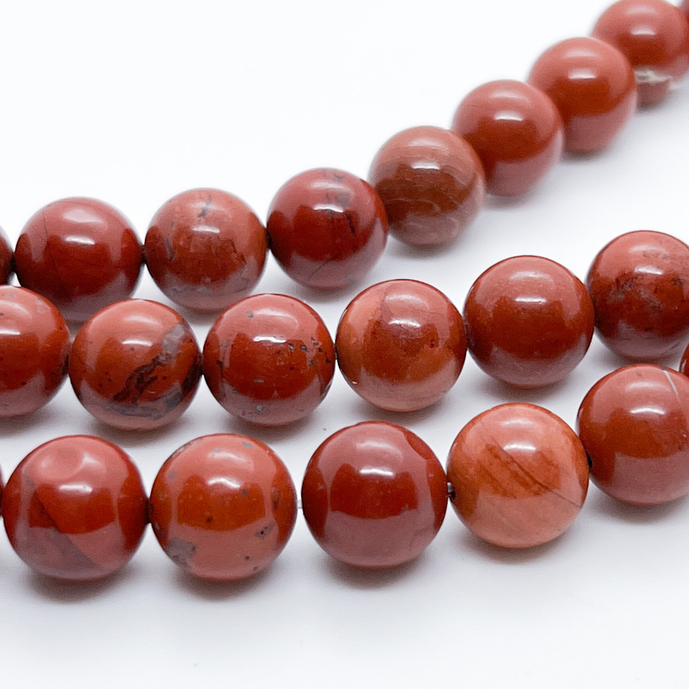 Яшма красная бусины, диаметр 10,2-10,4 мм, цена за 18-19 шт (1/2 нити)
