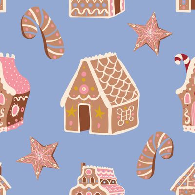 Новогодние пряничные домики, звёзды и конфеты на голубом фоне. Рождество. Christmas gingerbread houses