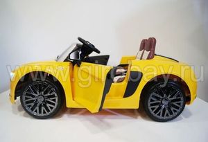 Детский электромобиль River Toys AUDI R8 желтый