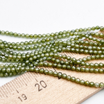 Фианит (кубический цирконий), цвет зеленый травяной, размер 2 мм, цена за нить около 195 шт (38 см)