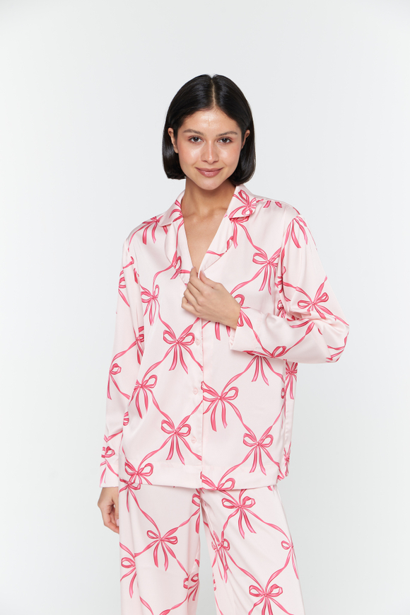 Шелковая блуза с бантами