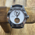 Часы Corum