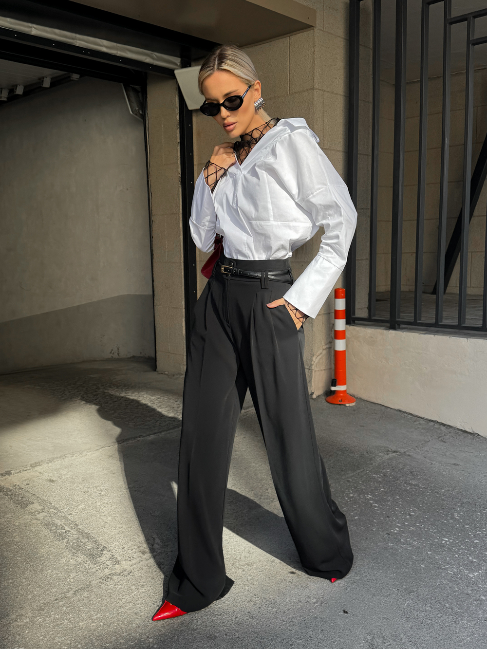 Брюки палаццо с защипами