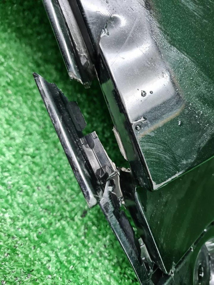 Бампер задний левая часть Geely Atlas Pro (21-нв)