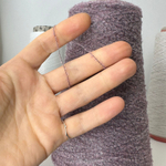 GILDINO - New Mill; 65% меринос, 35% п/а; 1400м/100гр; Букле мелкое; цвет: пыльно-розовый меланж на черной основе