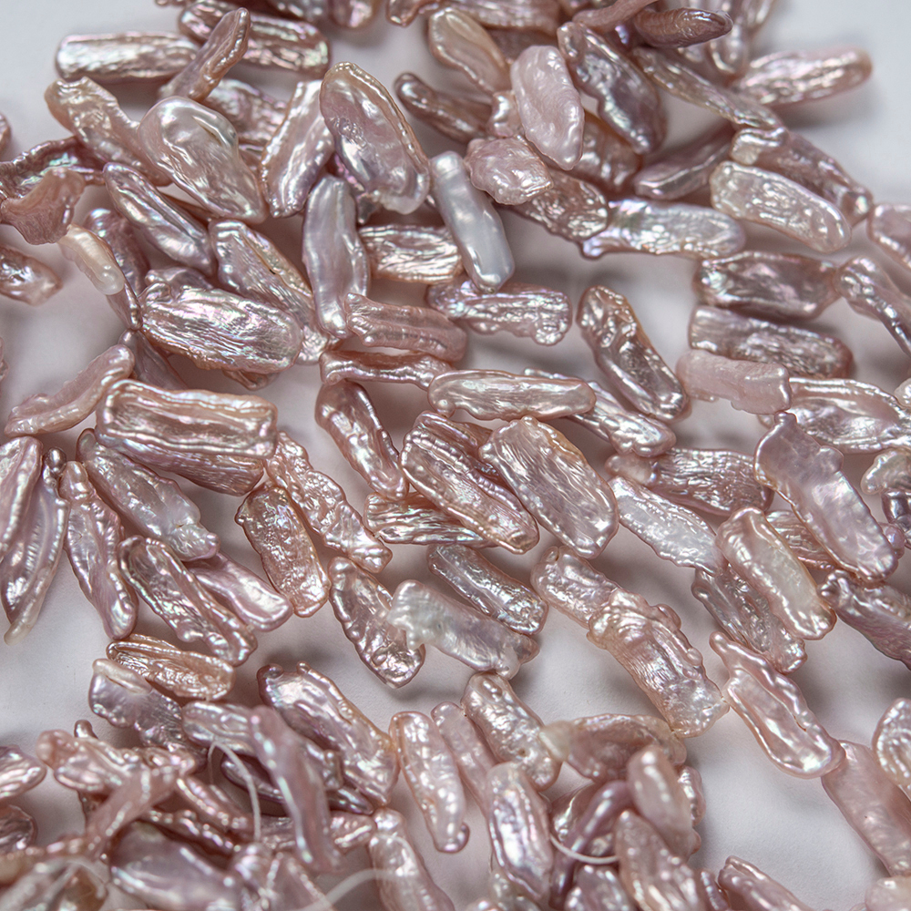 Жемчуг культивированный Бива, розовый, с эффектом хамелеона, со смещенным боковым отверстием 15-22*5-10мм