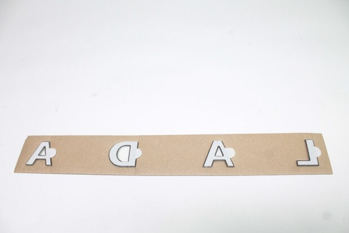 Эмблема задн.-надпись  LADA  новый хромиров. (Сызрань)