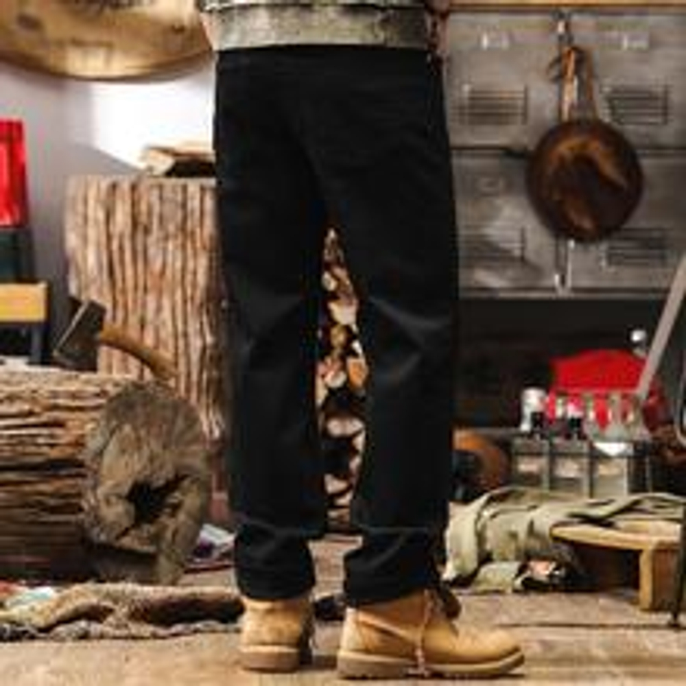 Тонкие джинсы чёрного цвета от бренда Jerryeno