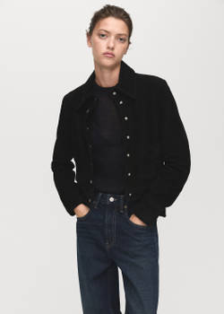 Джинсы с широкими штанинами и отворотами по низу