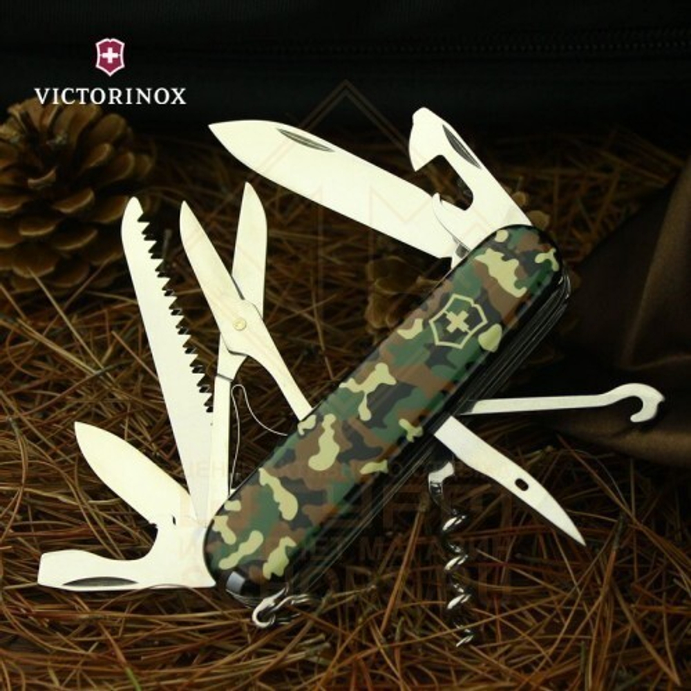 Нож многофункциональный Victorinox Huntsman 91 мм, Woodland