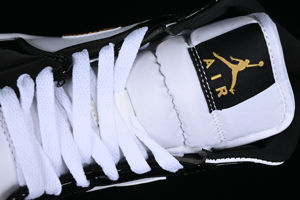 Jordan 1 mid black and gold 2025