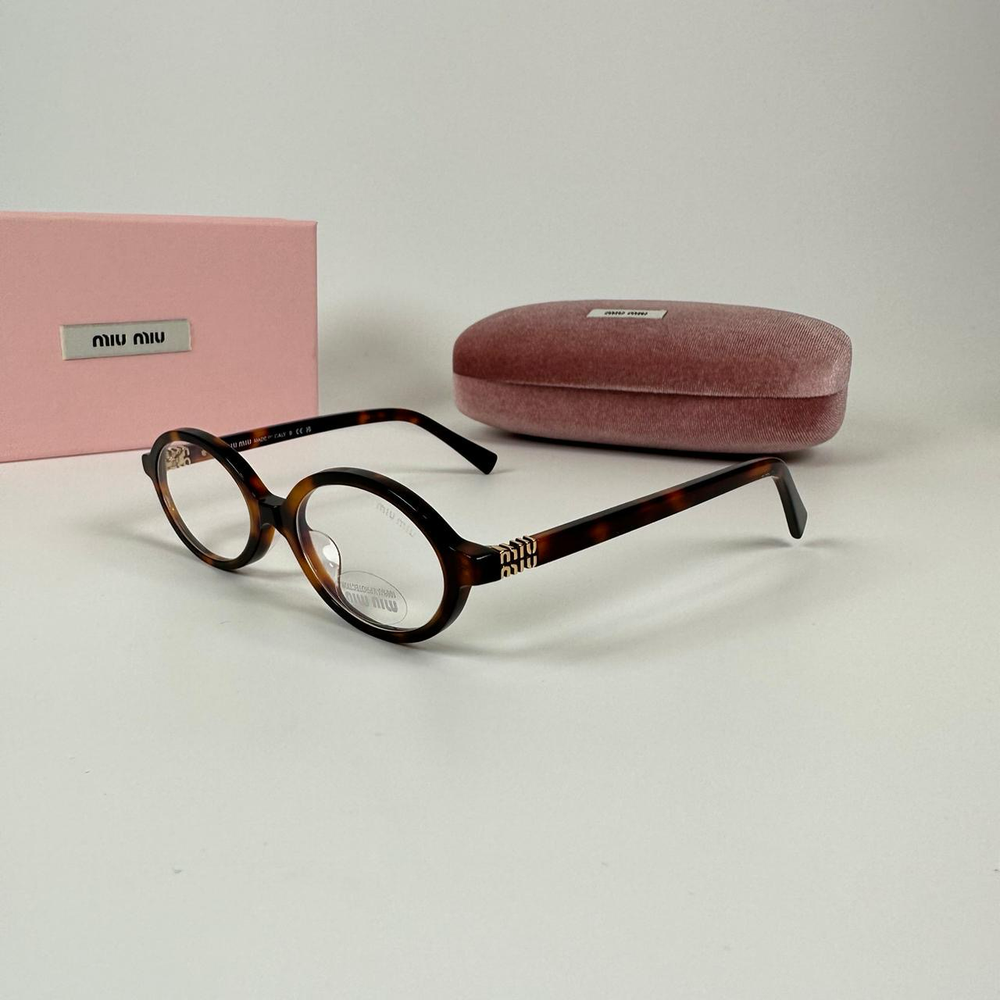 Солнцезащитные очки Miu Miu