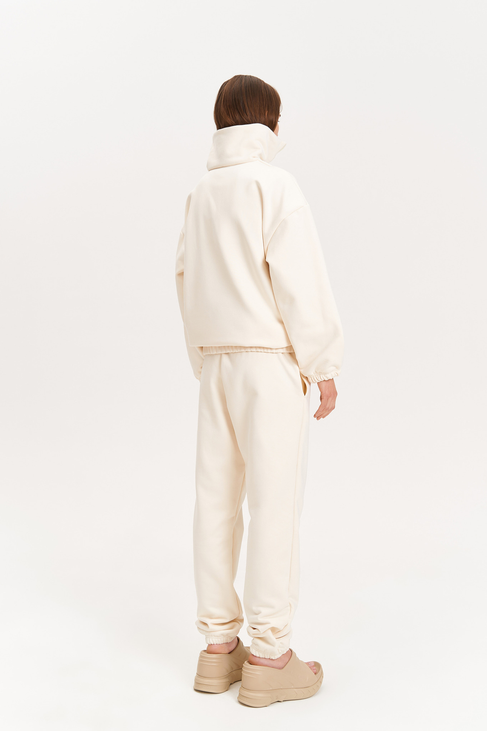 Брюки из утепленного трикотажа, молочные